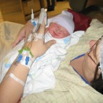 Mommy holding Belah fior first time
