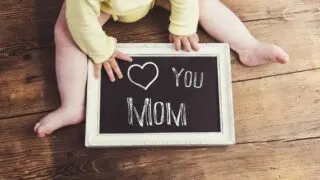 Baby with chalkboard