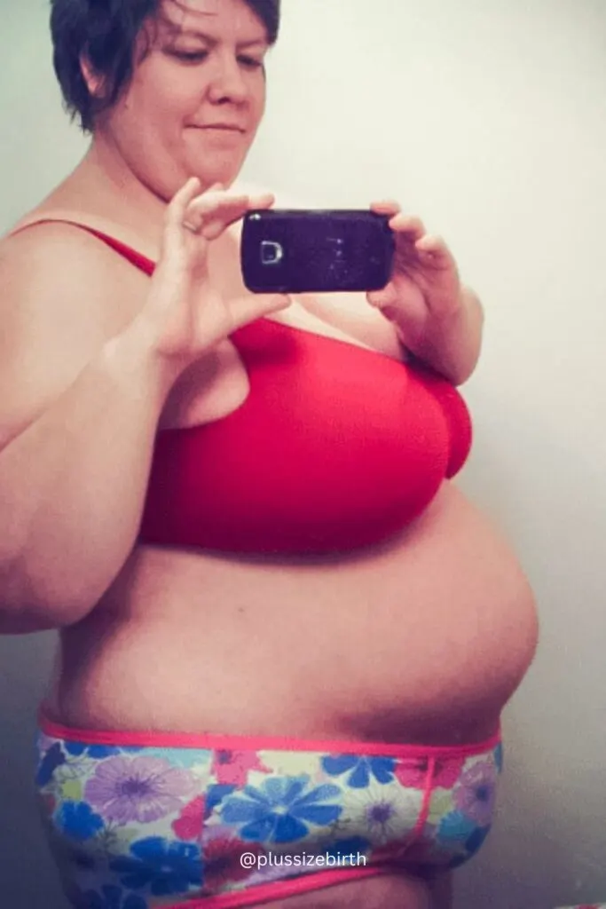 plus size pregnant woman in bra and underwear