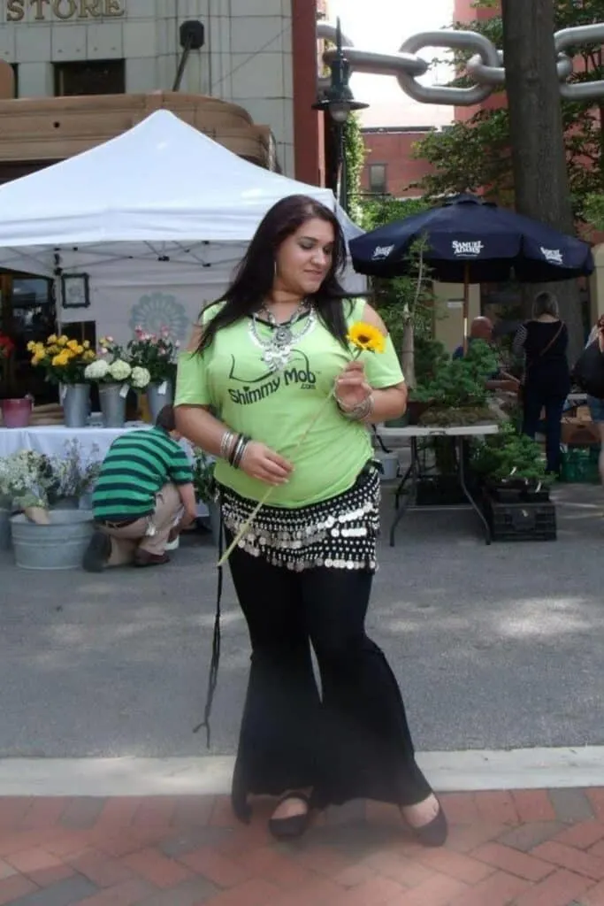 plus size pregnant belly dancing woman