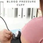 plus size woman having blood pressure taken