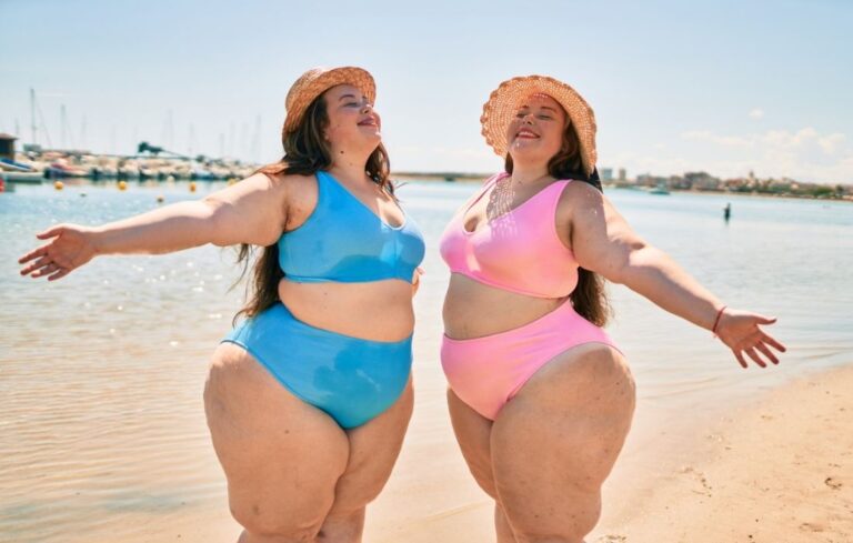 plus size twins on the beach with big thighs