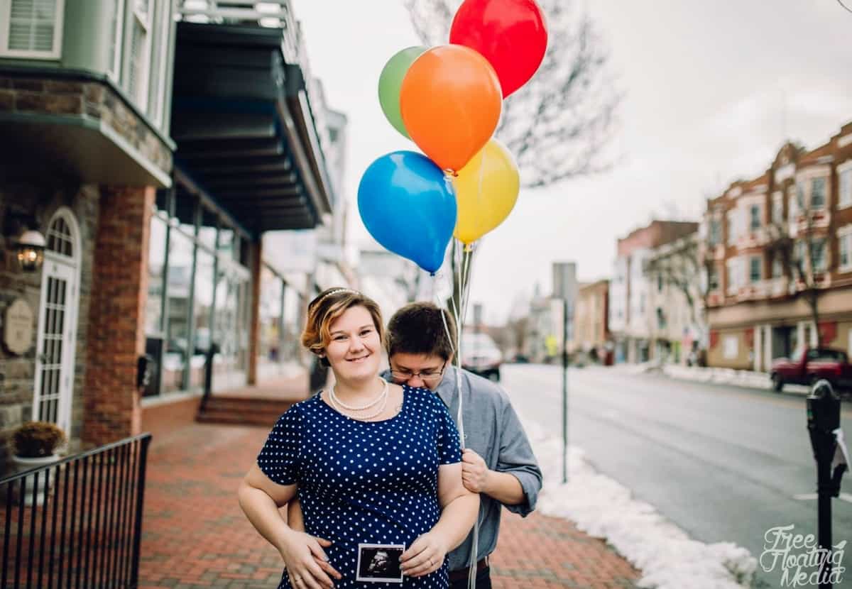 Rainbow baby plus size maternity shoot with balloons 