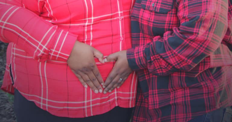 An LGBTQ couple sharing Plus Size Pregnancy Story