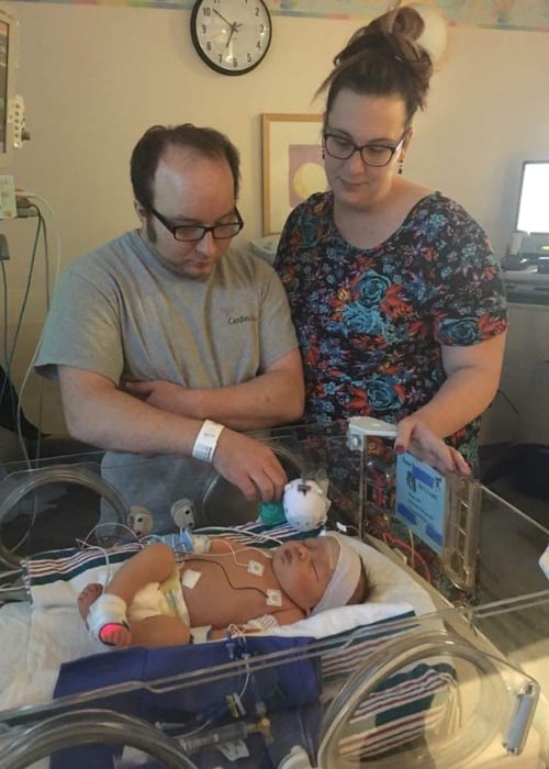 parents in the NICU with baby