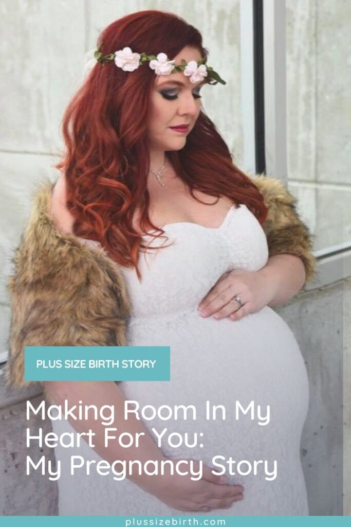 plus size pregnant woman wearing a white maternity dress