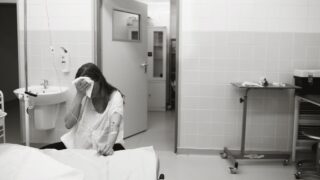 woman in hospital after having a stillbirth