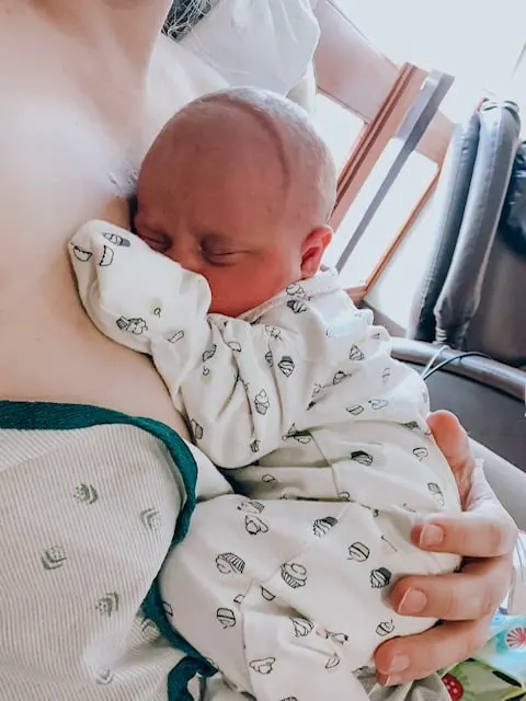 newborn on plus size moms chest