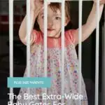extra-wide baby gate with a young girl standing by the gate