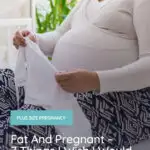 fat and pregnant woman holding white baby clothes