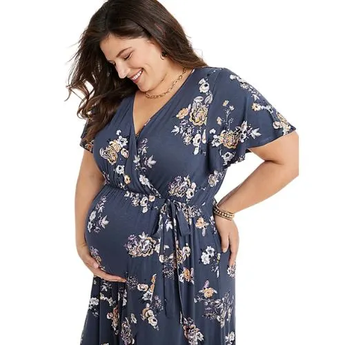 plus size woman wearing Maurices plus size maternity dress