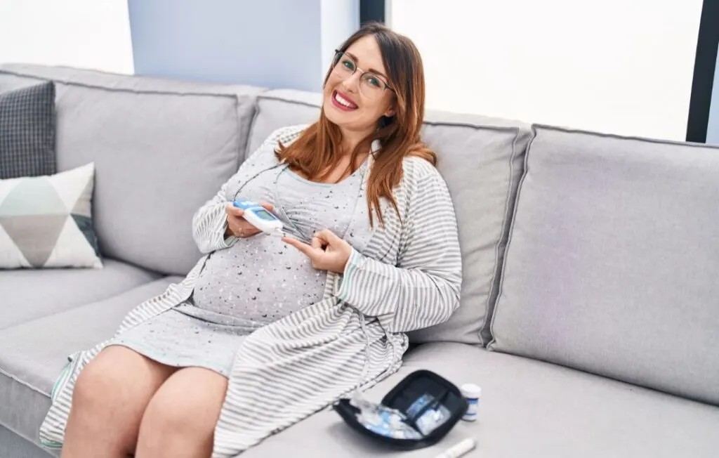 Gestational Diabetes Diagnosis of a plus size pregnant woman with a glucose monitor