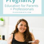 plus size woman holding a pregnancy test