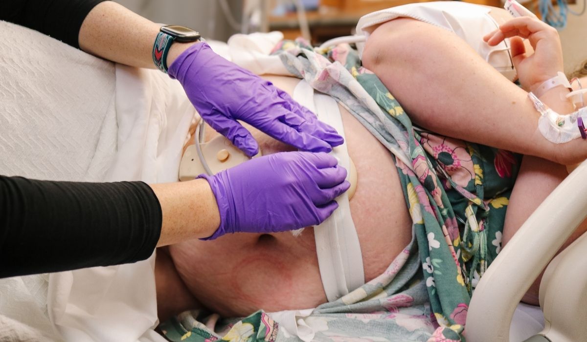 plus size pregnant woman fetal monitoring in hospital